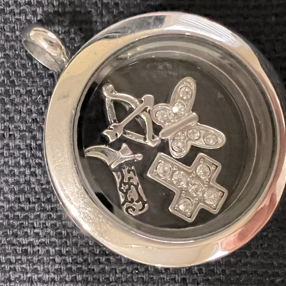 Origami Owl locket with charms